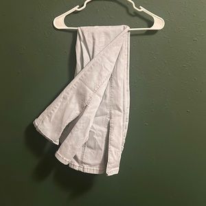 light wash flare jeans with ankle slit